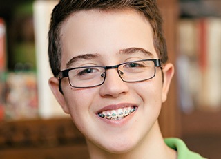 Preteen boy with braces